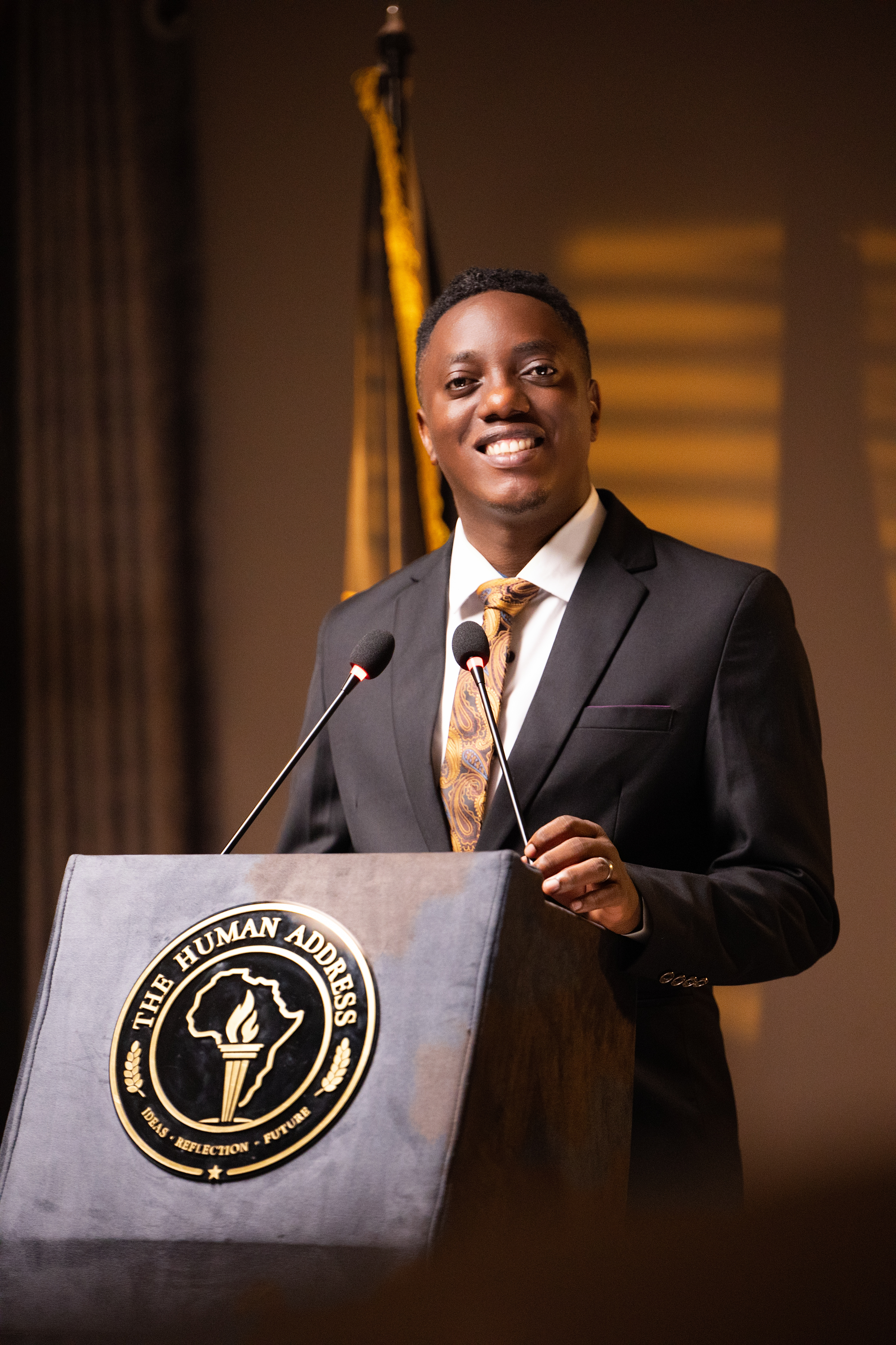 Hudson Tumusiime at podium