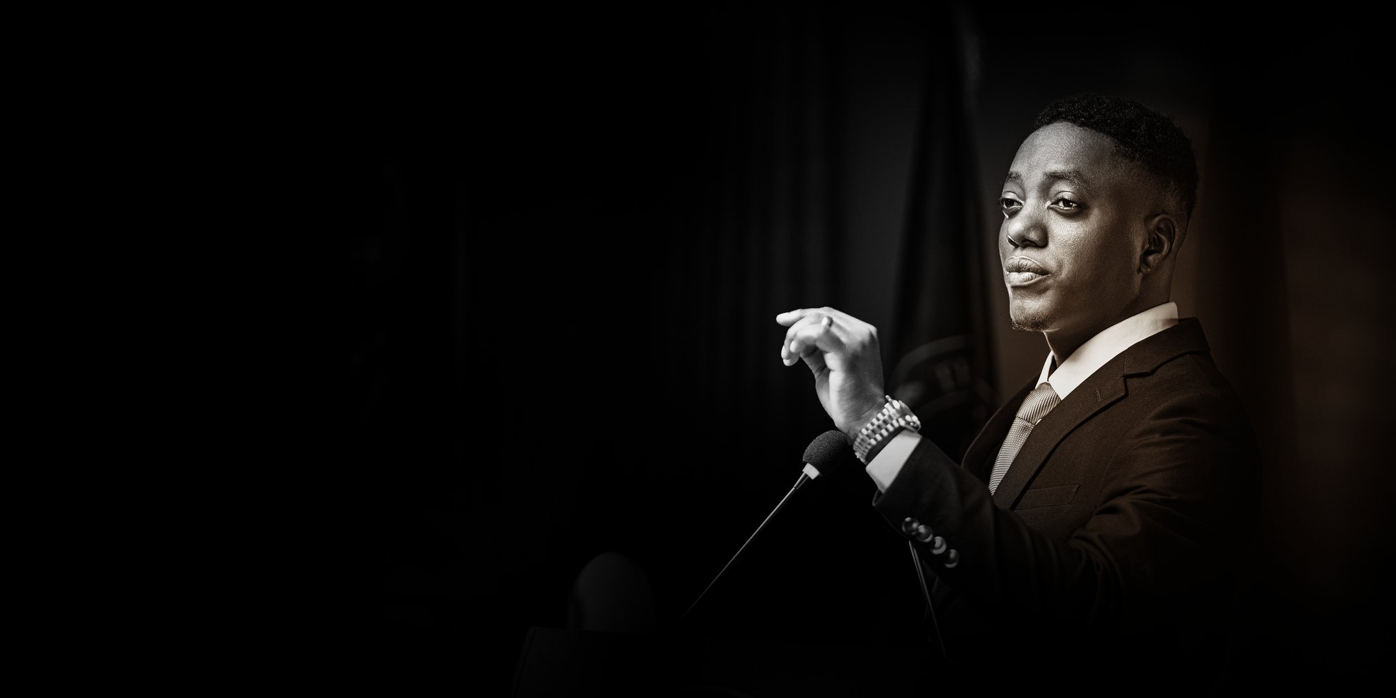 Hudson Tumusiime delivering address
